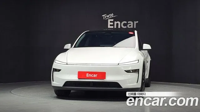 Tesla Model Y — Фото автомобиля 3