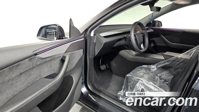 Tesla Model Y — Фото автомобиля 10