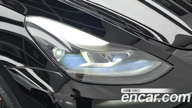 Tesla Model Y — Фото автомобиля 7