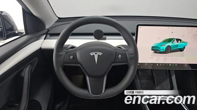 Tesla Model Y — Фото автомобиля 13