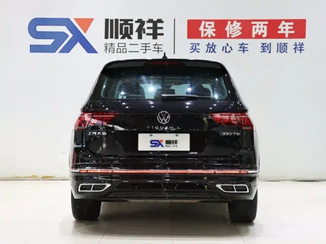 Volkswagen Tiguan L — Фото автомобиля 5