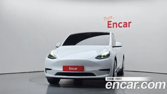 Tesla Model Y — Фото автомобиля 3