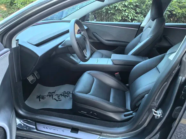 Tesla Model 3 — Фото автомобиля 7