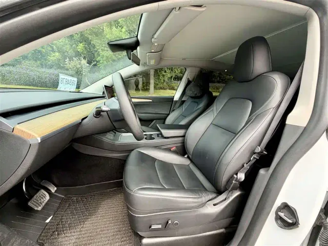 Tesla Model Y — Фото автомобиля 9