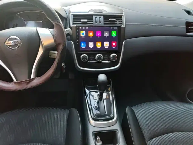 Nissan Tiida — Фото автомобиля 12