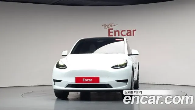 Tesla Model Y — Фото автомобиля 3