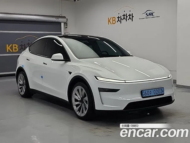 Tesla Model Y — Фото автомобиля 2