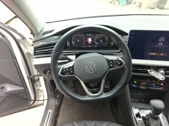 Volkswagen Tiguan L — Фото автомобиля 10