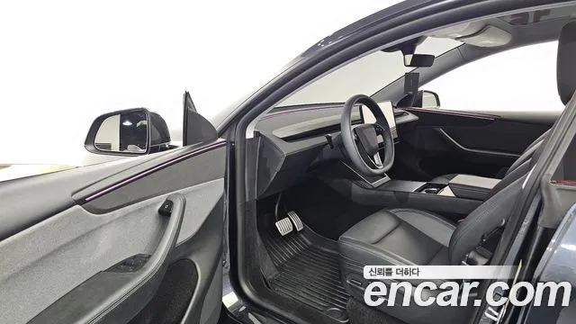 Tesla Model Y — Фото автомобиля 10