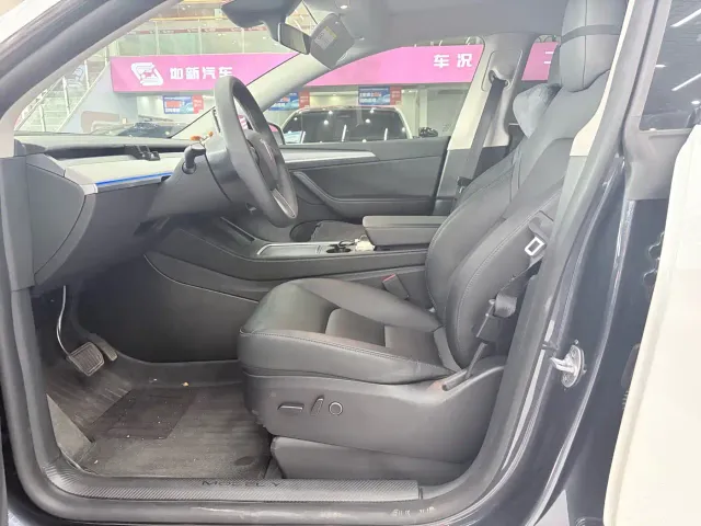 Tesla Model Y — Фото автомобиля 14