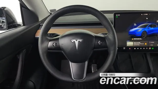 Tesla Model Y — Фото автомобиля 13