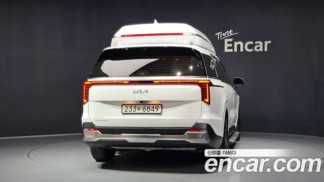 Kia Carnival Generation 4 — Фото автомобиля 4