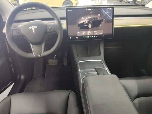Tesla Model Y — Фото автомобиля 9
