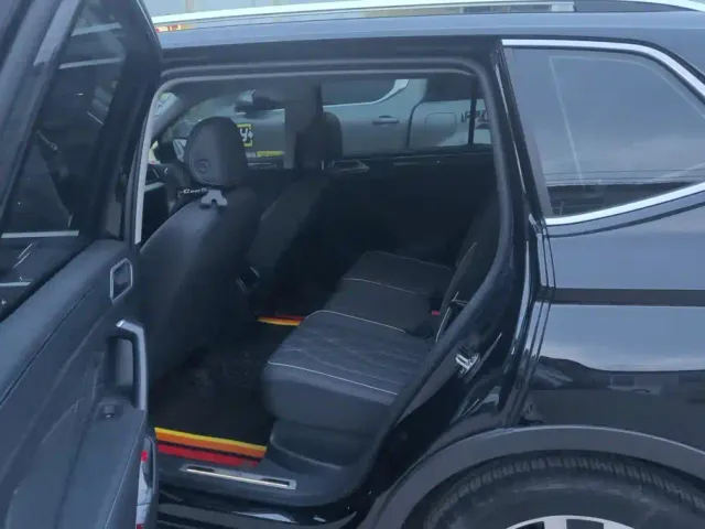 Volkswagen Tiguan L — Фото автомобиля 11
