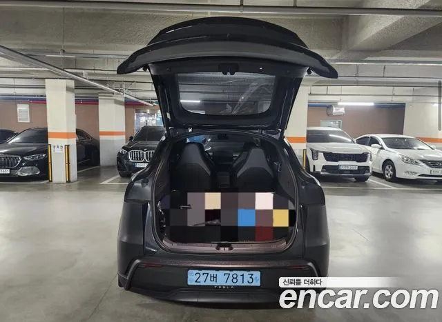 Tesla Model Y — Фото автомобиля 9