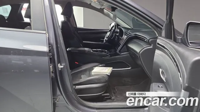 Hyundai Tucson Tucson (NX4) Бензин 1.6 турбо 2WD — Фото автомобиля 24