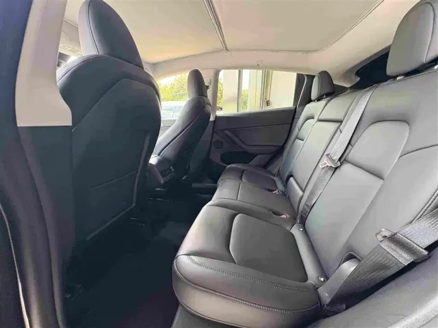Tesla Model Y — Фото автомобиля 7