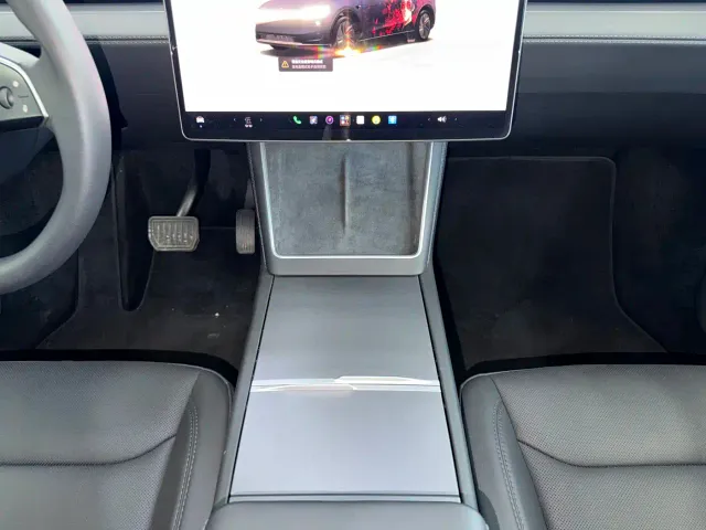 Tesla Model Y — Фото автомобиля 7