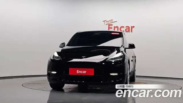 Tesla Model Y — Фото автомобиля 3