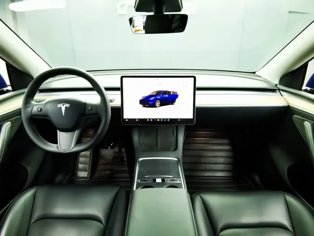 Tesla Model Y — Фото автомобиля 15