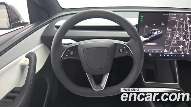 Tesla Model Y — Фото автомобиля 19
