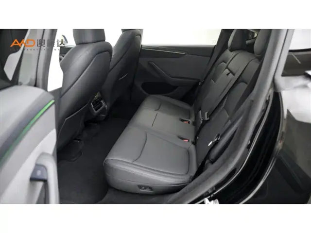 Tesla Model Y — Фото автомобиля 7