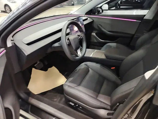 Tesla Model 3 — Фото автомобиля 14