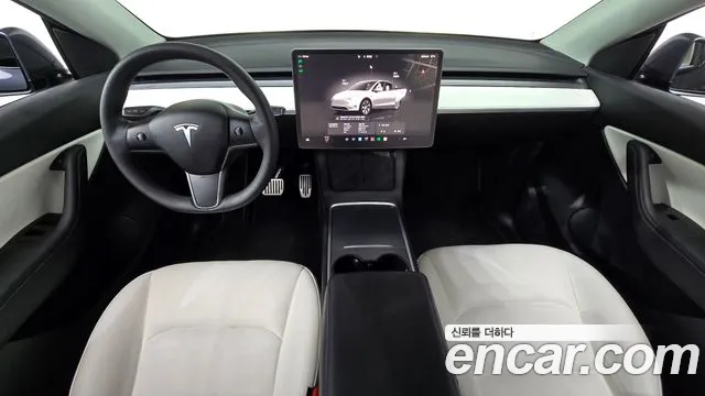 Tesla Model Y — Фото автомобиля 6