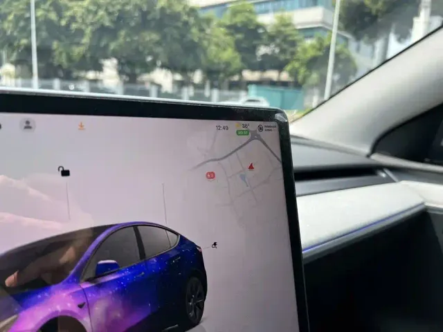 Tesla Model Y — Фото автомобиля 12