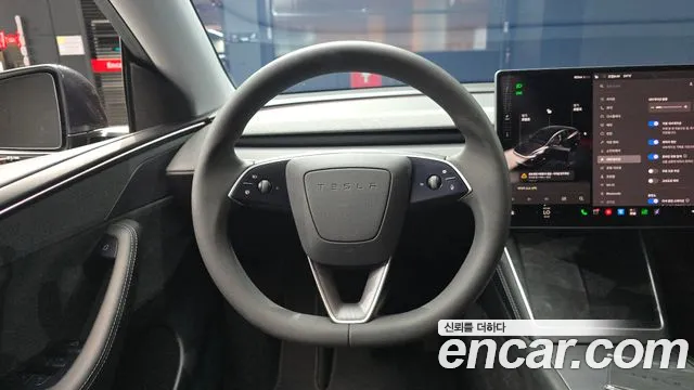 Tesla Model Y — Фото автомобиля 11