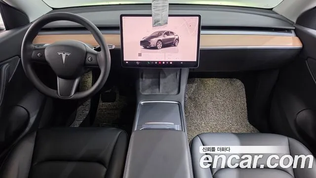 Tesla Model Y — Фото автомобиля 6