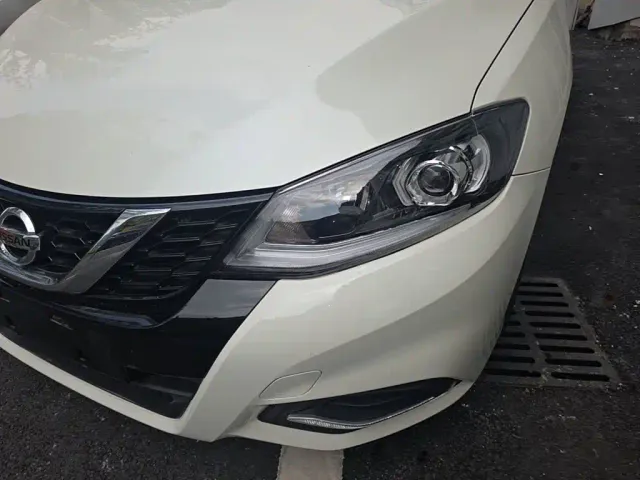 Nissan Tiida — Фото автомобиля 23