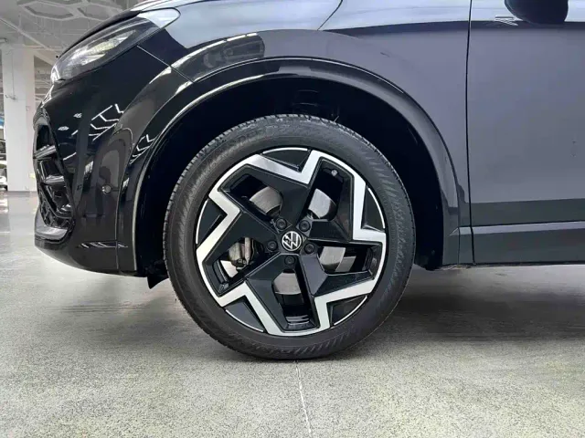 Volkswagen Tiguan L — Фото автомобиля 10