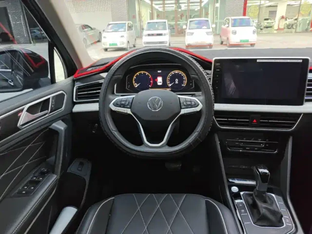 Volkswagen Tiguan L — Фото автомобиля 10