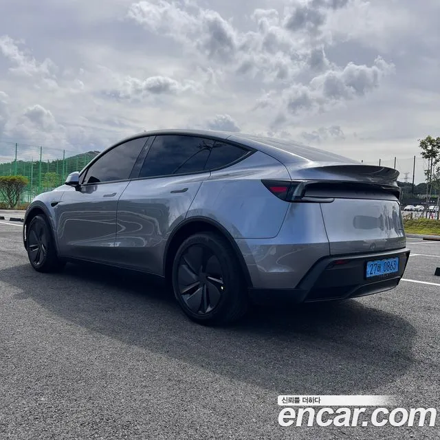 Tesla Model Y — Фото автомобиля 2