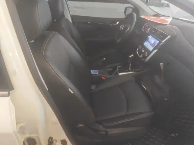 Nissan Tiida — Фото автомобиля 24