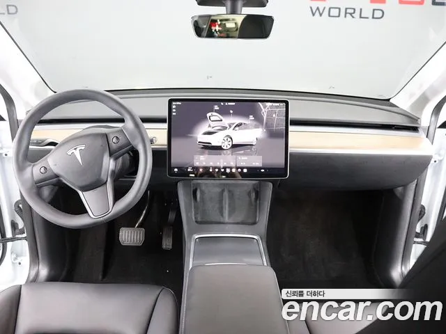 Tesla Model Y — Фото автомобиля 14