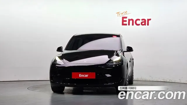 Tesla Model Y — Фото автомобиля 3