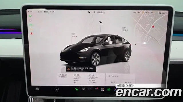 Tesla Model Y — Фото автомобиля 11