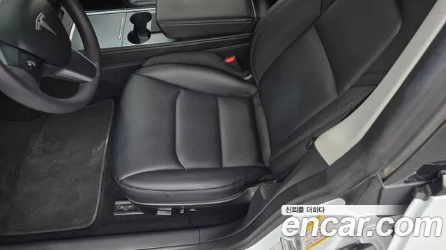 Tesla Model 3 — Фото автомобиля 20