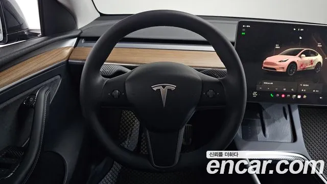 Tesla Model Y — Фото автомобиля 13