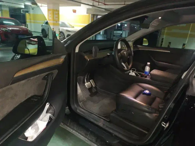 Tesla Model Y — Фото автомобиля 13