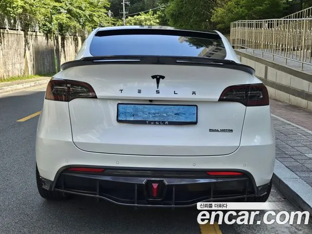 Tesla Model Y — Фото автомобиля 5