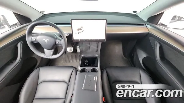 Tesla Model Y — Фото автомобиля 7