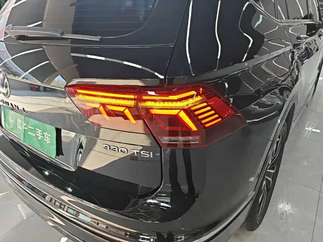Volkswagen Tiguan L — Фото автомобиля 7