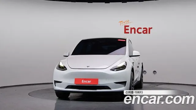 Tesla Model Y — Фото автомобиля 3
