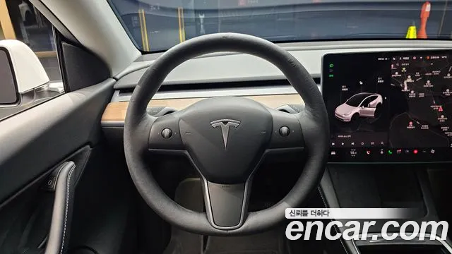 Tesla Model Y — Фото автомобиля 13
