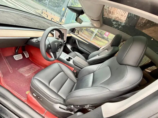 Tesla Model Y — Фото автомобиля 8