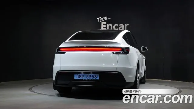 Tesla Model Y — Фото автомобиля 4