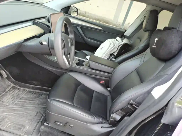 Tesla Model Y — Фото автомобиля 14